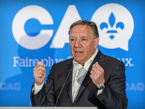Premier François Legault appears at an event last month to introduce a CAQ candidate in the coming provincial election.