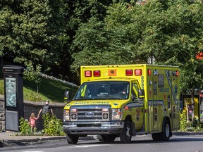 An ambulance makes its way to the Montreal General Hospital on Thursday July 21, 2022.