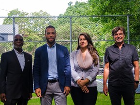 Bloc Montréal Leader Balaram Holness, second from left, introduced three new candidates for his party on Wednesday, including: Keeton Clarke, left, and Janusz Kaczorowski, right. With them is Anastasia Pomares, the official agent of Bloc Montréal.
