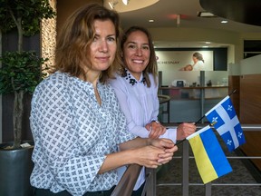 Mariia Savchuk, a translator and journalist in Ukraine, is now a senior communications consultant at Duchesnay, a Blainville-based pharmaceutical firm.  Savchuk, left, and Caroline Guerru, senior director of human resources and communications on Thursday.