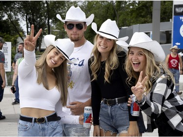 Franco-Ontarians Jade, Jake, Ariane and Sarah travelled to see the Lasso country music festival in Montreal on Friday, August 12, 2022.