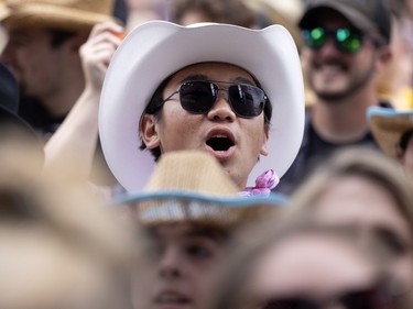 Fans cheer JoJo Mason during the Lasso country music festival, in Montreal on Friday, August 12, 2022.