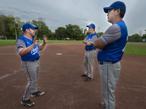 “The coaches (are) broken-hearted for our kids; we also feel guilty to some extent because some of it is absolutely our responsibility,” says West Island Royals head coach Alain Cloutier left, with assistant coaches Mark Paterson, centre, and Dustin Lee.