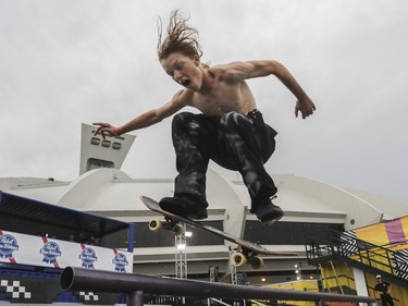 Jack Pomeroy of Pembroke, Ont., practices on the Street Skate course during a rain delay at the Jackalope festival on the Esplanade of the Olympic Park in Montreal Sunday, August 21, 2022.