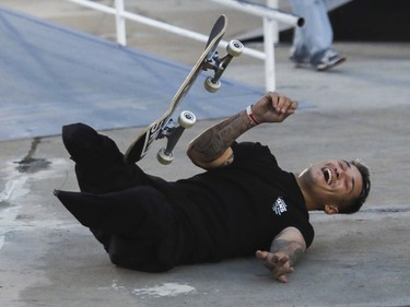 Felipe Nunes of Brazil has a laugh as he falls on his last trick in the semi-final of the Street Skate competition at the Jackalope festival. Felipe lost his legs when a train ran over them when he was six and he was given a skateboard for transport.