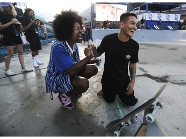 Felipe Nunes (right) of Brazil has a laugh with his manager Davison Fortunato prior to the men's semi-final of the Street Skate competition at the Jackalope festival on Sunday, Aug. 21, 2022.