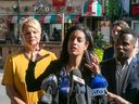 Quebec Liberal Leader Dominique Anglade, centre, speaks at a news conference in front of Napoli Pizzeria on Thursday August 25, 2022. The restaurant was the site of one of Tuesday's shootings.