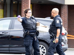 Montreal police at the scene of the Aug. 12 shooting in the borough of Rivière-des-Prairies—Pointe-aux-Trembles.
