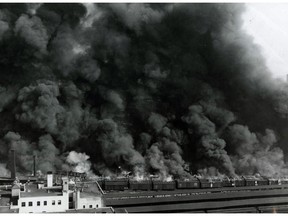 A spectacular fire devastates the Bonaventure freight yards in downtown Montreal on Aug. 23, 1948.
