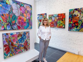 Artist Norma Akkelian with her work on display at Galérie Erga in Montreal on Wednesday, August 31, 2022.  Some of the proceeds from the show will go to Shield of Athena Family Services and Armenian Family Support Services.