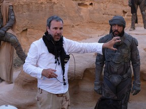 Denis Villeneuve and Javier Bardem on the set of Dune, which screens Sept. 4 at 7 p.m. on the Esplanade Tranquille in Quartier des Spectacles.
