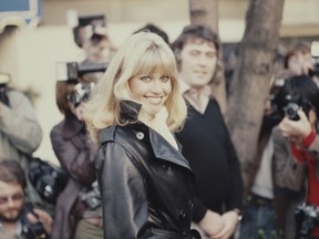 Australian actress and singer Olivia Newton-John at the Inn On The Park in London in 1978, the year Grease was released. She has died at 73 years old.