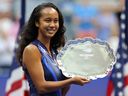 Leylah Annie Fernandez of Canada celebrates with the runner-up trophy after being defeated by Emma Raducanu of Great Britain during their Women's Singles final match on Day Thirteen of the 2021 US Open at the USTA Billie Jean King National Tennis Center on September 11, 2021 in the Flushing neighborhood of the Queens borough of New York City.