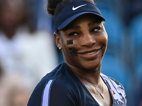 (FILES) In this file photo taken on June 21, 2022 US player Serena Williams reacts as she plays with Tunisia's Ons Jabeur against Spain's Sara Sorribes Tormo and Czech Republic's Marie Bouzkova during their round of 8 women's doubles tennis match , on day three, of the Eastbourne International tennis tournament in Eastbourne, southern England. - Serena Williams announced on August 9, 2022 the countdown to her retirement had begun from tennis after a career which brought her 23 Grand Slam singles titles.