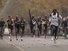Eliud Kipchoge runs on his way to break the historic two-hour barrier for a marathon in Vienna, Saturday, Oct. 12, 2019.