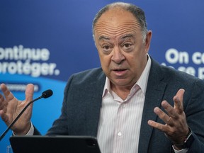 Quebec Health Minister Christian Dube speaks during a news conference in Montreal, Thursday, July 7, 2022, where he gave an update on the ongoing COVID-19 pandemic in the province.