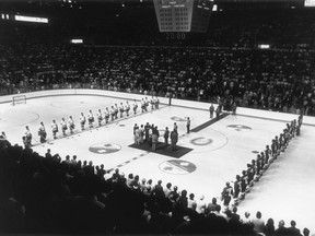 The Canadian and Soviet teams line up for the national anthems before the start of Game 1 in the eight-game Summit Series at the Forum in Montreal on Sept. 2, 1972.