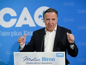 Quebec Premier and Coalition Avenir Quebec leader Francois Legault speaks at the nomination meeting of Martine Biron, candidate at the Chutes-de-la-Chaudiere riding for the CAQ, Wednesday, August 10, 2022 in Levis, Que.