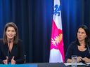 Montreal Mayor Valérie Plante, right, looks on as Quebec Public Security Minister Geneviève Guilbault speaks during a news conference in Montreal, Saturday, August 27, 2022, where she outlined plans to tackle gun violence in Montreal.