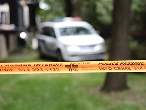 Police tape surrounds a crime scene in Montreal.