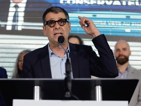 Conservative Party of Quebec Leader Éric Duhaime gestures as he speaks during a rally in Quebec City on Sunday August 21, 2022.