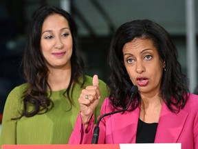 Quebec Liberal Leader Dominique Anglade responds to reporters questions at a news conference, Wednesday, August 31, 2022  in St-Agapit. Saint-Laurent candidate Marwah Rizqy, left, looks on.