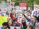 People take part in a protest against Bill 96 in Montreal on May 26, 2022. A Quebec Superior Court judge temporarily struck down two articles of the province's new language law, saying they could prevent some speech organizations from English have access to justice through the courts.  .