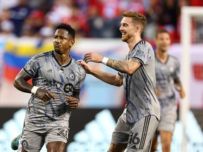 CF Montreal forward Romell Quioto (30) reacts after scoring a goal against the Chicago Fire during the first half at Soldier Field on Aug. 27, 2022.