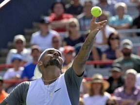 Nick Kyrgios serves against Daniil Medvedev (not pictured) in second-round play at IGA Stadium in Montreal Wednesday, Aug. 10, 2022.