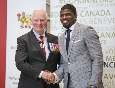 P.K. Subban receives the Meritorious Service Cross from Governor General David Johnston at the Montreal Children's Hospital on March 1, 2017.