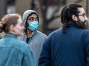 Some Montrealers continue to wear masks when traveling.