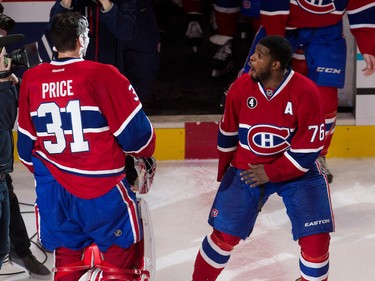 Montreal Canadiens defenceman P.K. Subban teases  goalie Carey Price after he was pied in the face at the Bell Centre on April 9, 2015. Price set a new team record with 43 regular season wins.