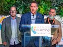 Montreal Alouettes president Mario Cecchini is flanked by general manager Danny Macocia, left, and team owner Gary Stern at the 18th annual Sports Celebrity Breakfast, raising funds for the Cummings Jewish Centre for Seniors in Montreal on June 12, 2022.