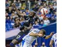 CF Montréal forward Kei Kamara heads the ball high above Cruz Azul defender Joaquin Martinez during CONCACAF action at the Olympic Stadium in Montreal on March 16, 2022.