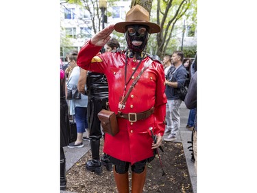 Ricardo Gimeno wears a latex Mountie outfit during Fetish Weekend in downtown Montreal on Sunday, Sept. 4, 2022.