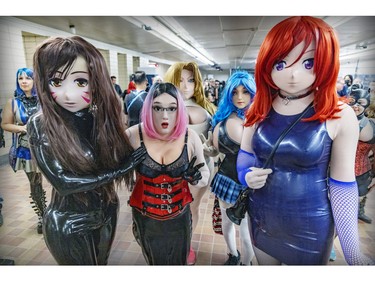 Fetish Weekend participants dressed as anime characters gather at the St-Laurent métro station during a fetish photo walk in downtown Montreal on Sunday, Sept. 4, 2022.