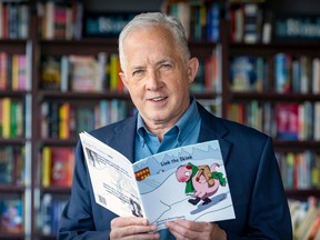 Broadcaster/children's author Richard Dagenais with his latest book Link the Stink at Clio bookstore in Pointe-Claire.