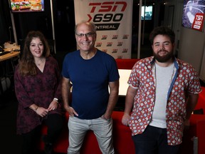 Mitch Melnick centre, host of Melnick in the Afternoon with show producer Andie Bennett left and sports anchor Jon Still in Montreal on Sept. 7, 2022. TSN 690 Radio is celebrating its 20th anniversary.