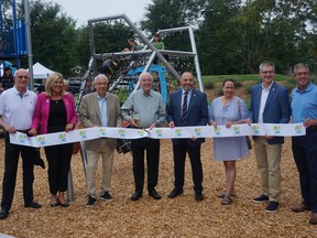 Beaconsfield Mayor Georges Bourelle (centre), city councillors and local MP Francis Scarpaleggia were on hand for the ribbon cutting ceremony for the revamped Briarwood Park.