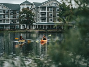 Peaceful paddling is one of the highlights of the new Saranac Waterfront Lodge.