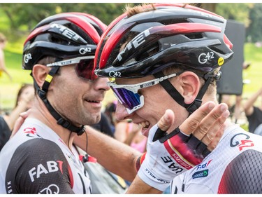 The Grand Prix Cycliste de Montréal returned to the city on Sunday, Sept. 11, 2022. Team UAE Emirates Tadej Pogacar, right, is congratulated by a teammate after winning the Grand Prix.