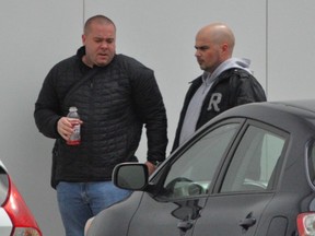 Convicted hit man Frédérick Silva (left) and alleged accomplice Giovanni Presta are seen in this photo taken while Silva was under police surveillance.