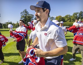 Sean Monahan joins team-mates at the Montreal Canadiens' annual golf tournament in Laval on Sept. 12, 2022.