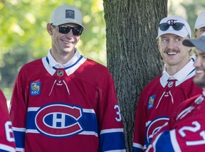 Canadiens Carey Price laughs with team-mates Jonathan Drouin and Michael Pezzetta prior to the team's annual golf tournament in Laval on Sept. 12, 2022.