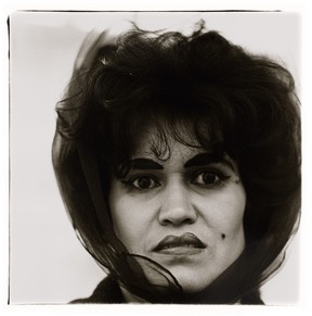 Puerto Rican Woman With a Beauty Mark, N.Y.C., 1965, by Diane Arbus.