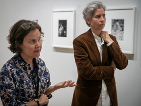 Anne Grace, left, curator of modern art at the Montreal Museum of Fine Arts, and Sophie Hackett, curator of the exhibition and curator of photography at the Art Gallery of Ontario, discuss the new Diane Arbus show at the MMFA.