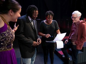 Composer Tim Brady, far right, and stage director Cherissa Richards, second from right, speak with cast members Ruben Brutus and Alicia Ault during rehearsals for Backstage at Carnegie Hall, which runs Friday and Saturday at the Centaur Theatre.