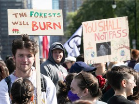 People attend the climate march along Park Ave. in Montreal on Friday, Sept. 23, 2022.