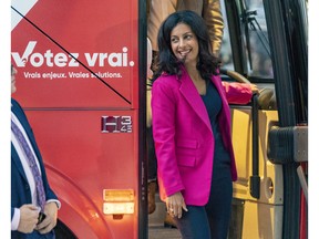 Quebec Liberal Party Leader Dominique Anglade exits her campaign bus Sept. 22, 2022.
