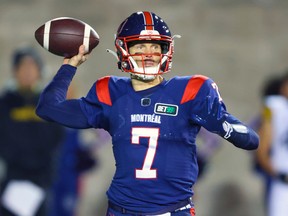 Montreal Alouettes' Trevor Harris throws a pass during first half against the Hamilton Tiger-Cats in Montreal on Sept. 23, 2022.